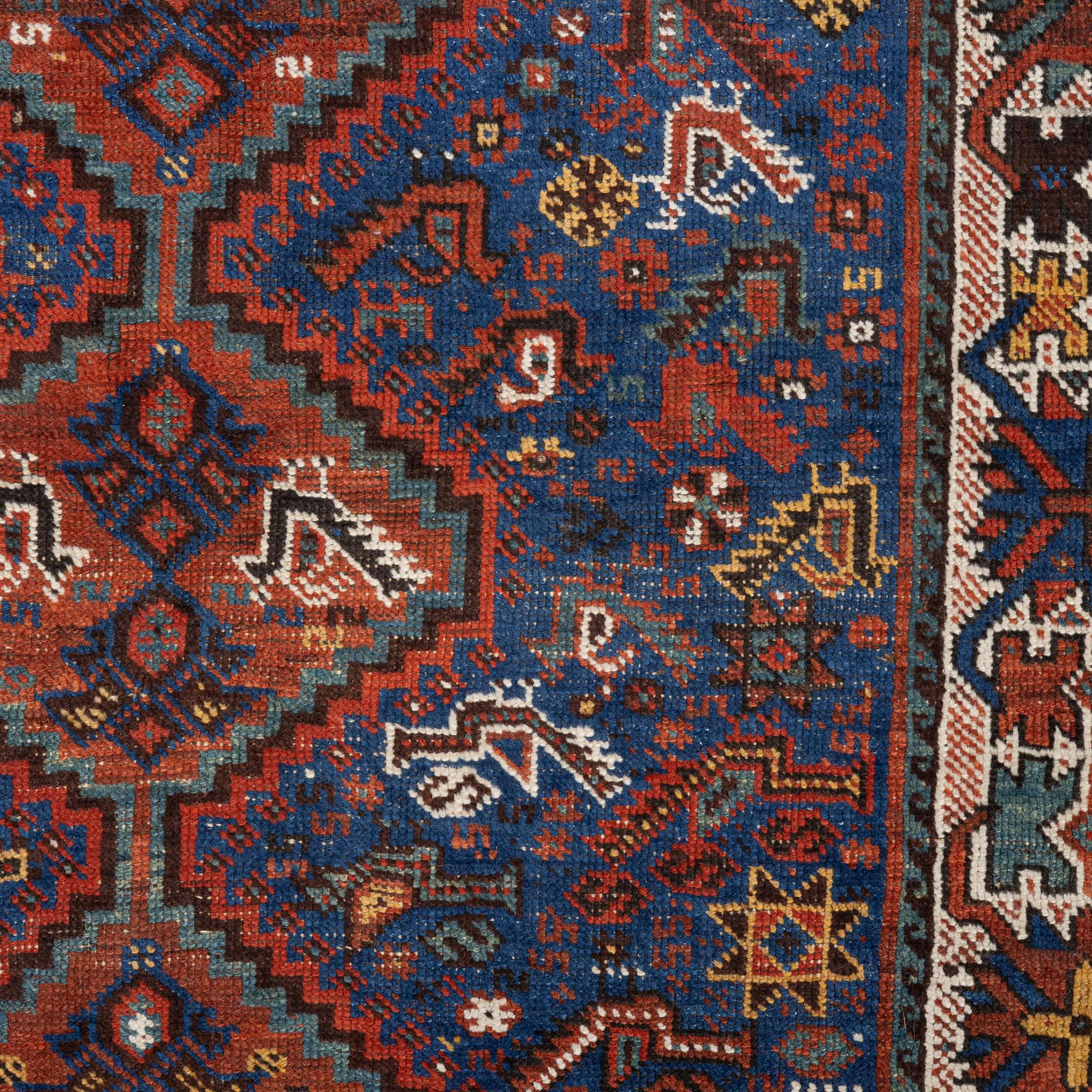 An antique Kamseh rug, c. 150 x 118 cm.