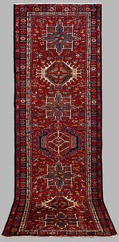 A SEMI-ANTIQUE KARADJA RUNNER, AROUND 320 x 100 cm.