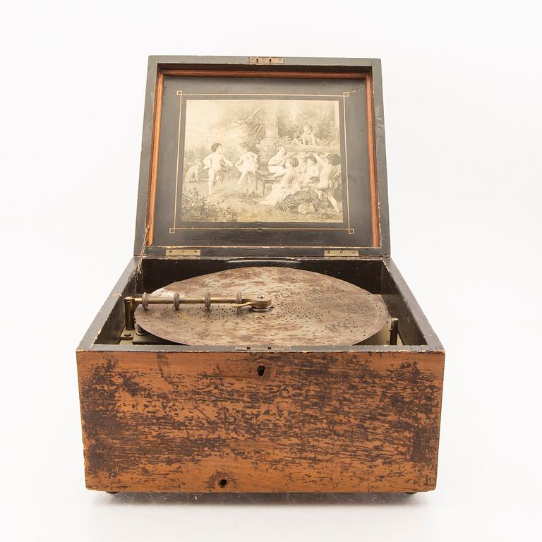 Polyphon wooden music box with sevem discs, around 1900's.