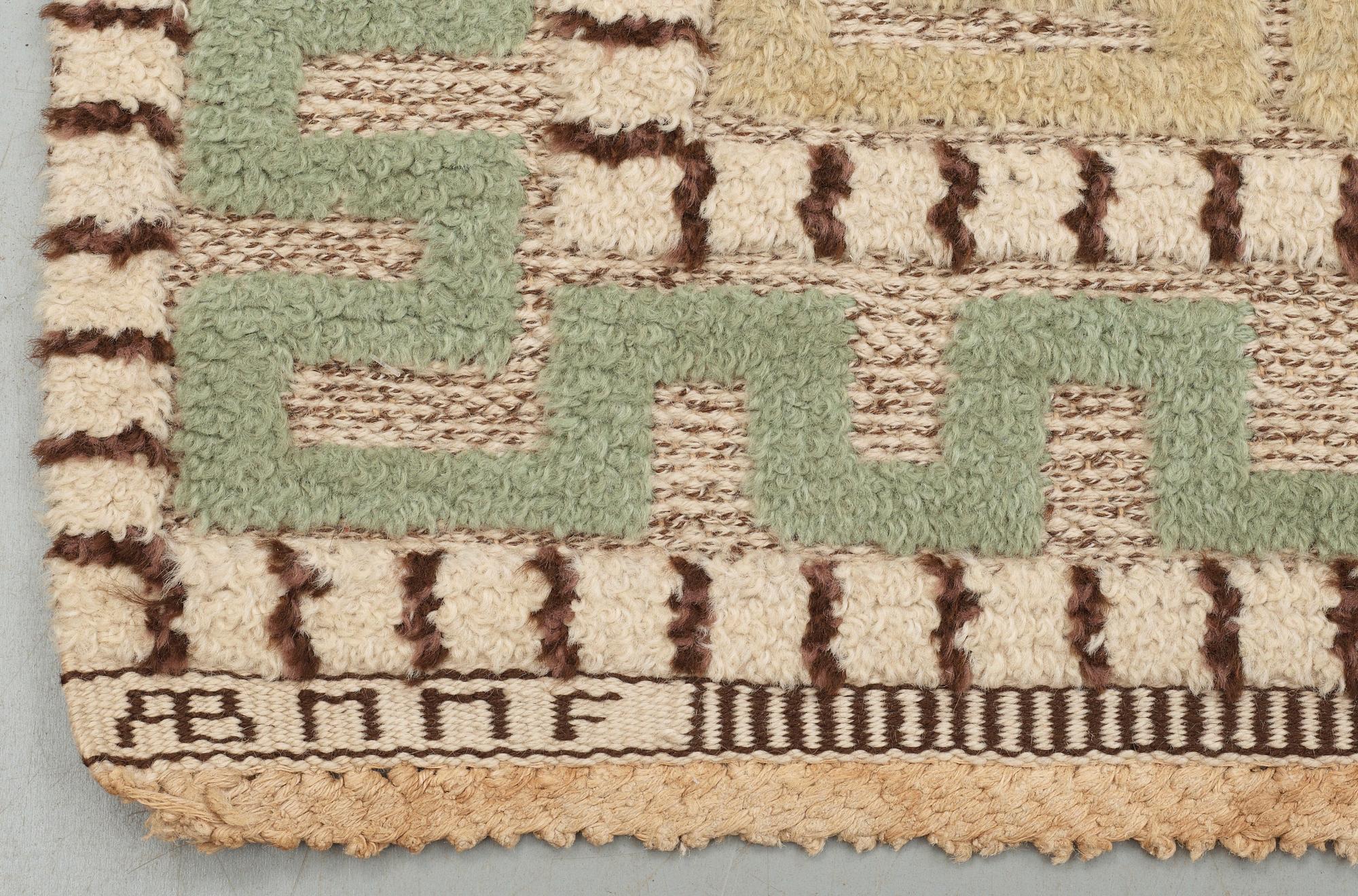 CARPET. "Ursula". Knotted pile in relief. 278,5 x 164 cm. Signed AB MMF.