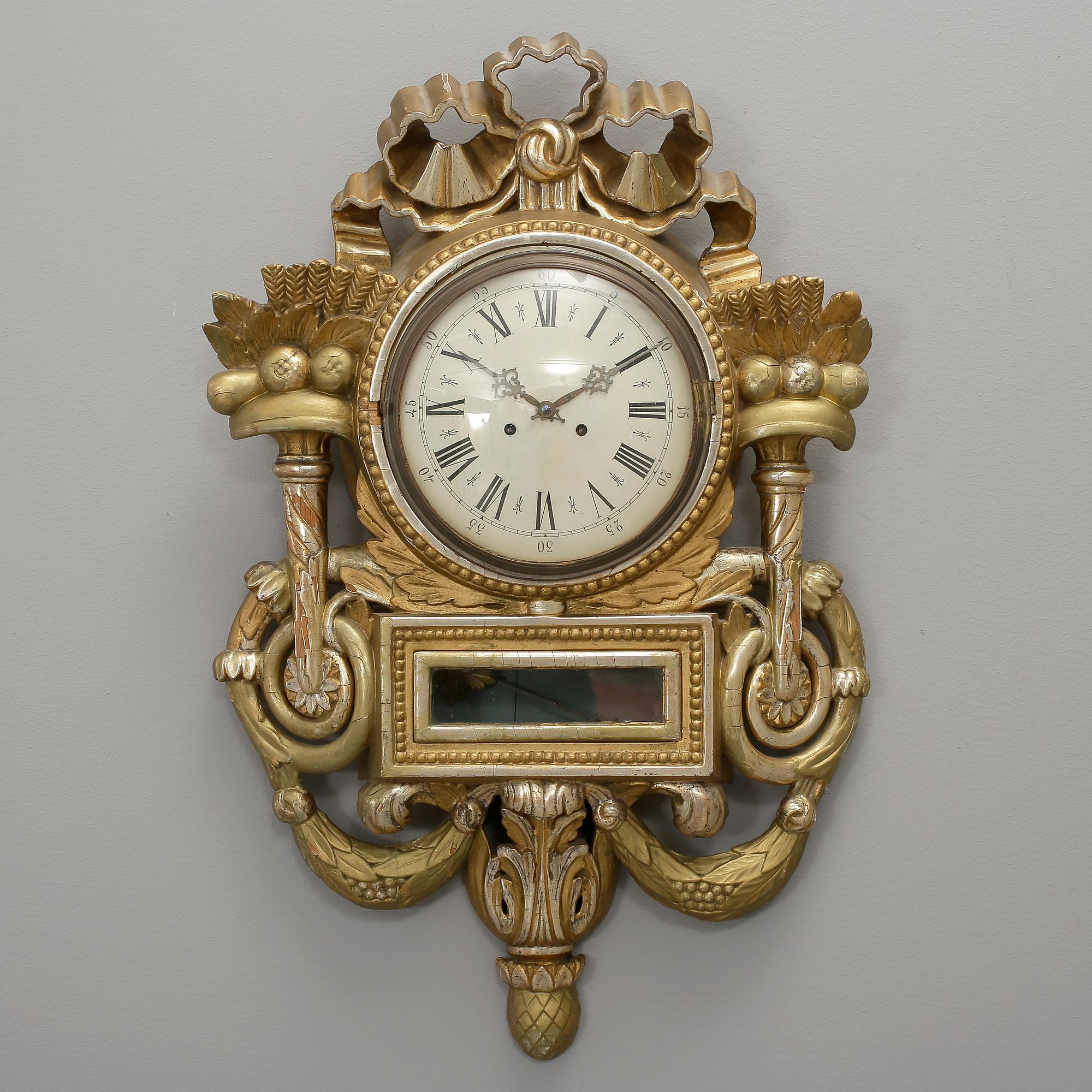VÄGGPENDYL. Empire, 1800-talets första hälft.