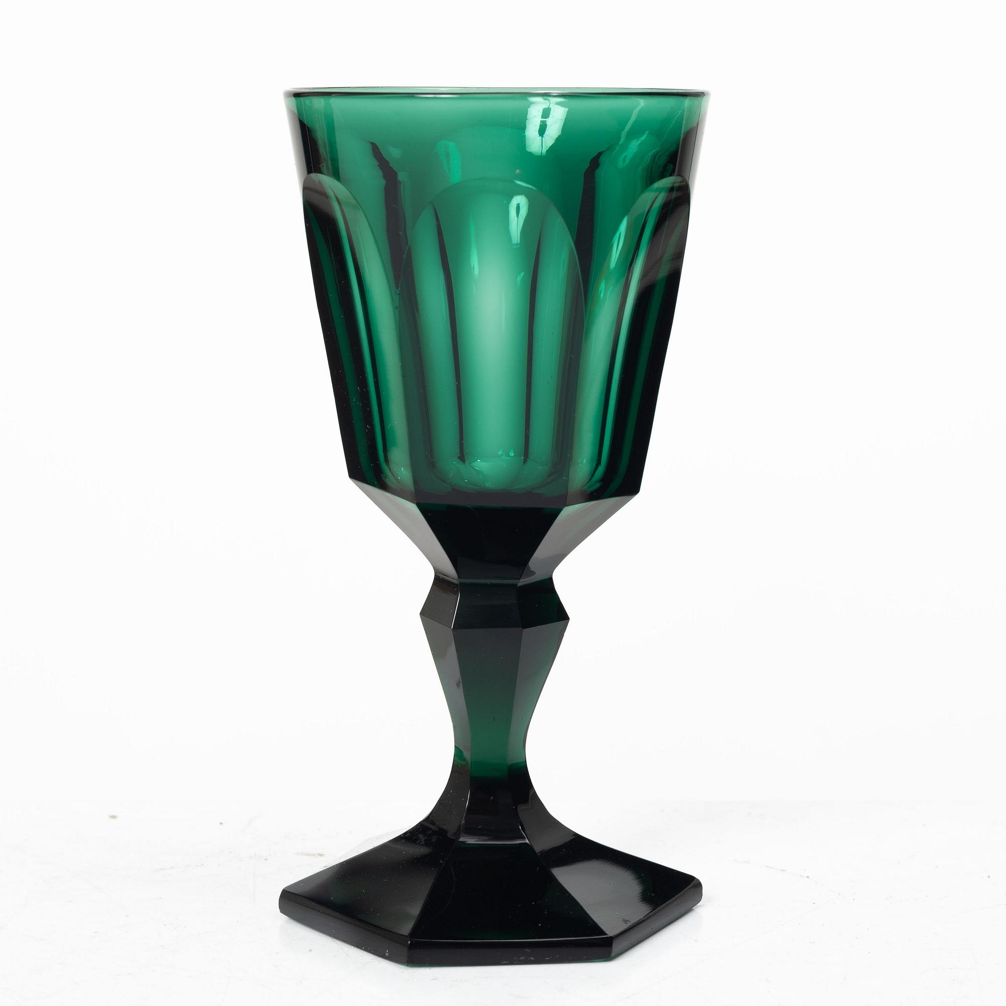 Eleven white wine glasses, green, 19th century.