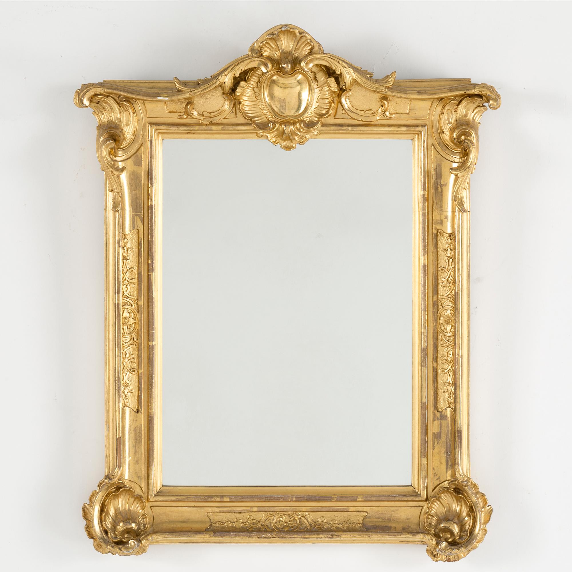 A carved gilt-wood 'Rococo' frame, possibly 18th century.