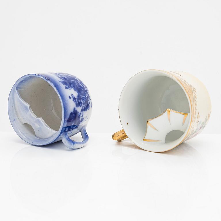 Mustaschkoppar, 24 par, porslin, bla England och Tyskland, 1800 och 1900-tal.