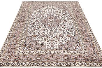 A Kashan carpet, c. 357 x 240 cm.