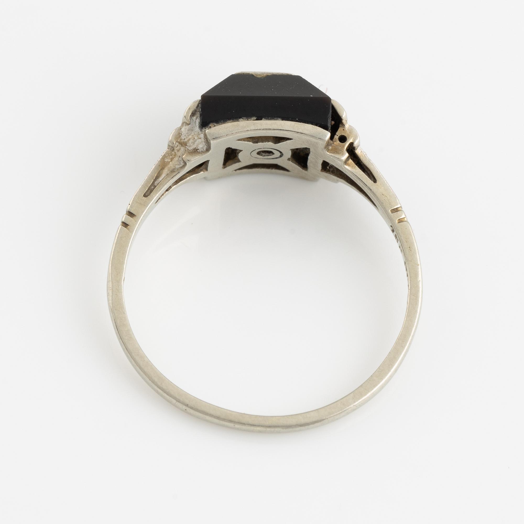 18K white gold, onyx with round brilliant cut diamond ring.