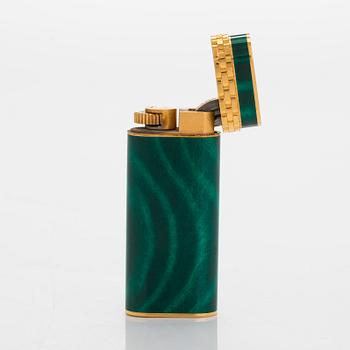 Cartier, A gilded and laquered metal lighter. Marked Cartier, Paris, 6846 X, Swiss made.