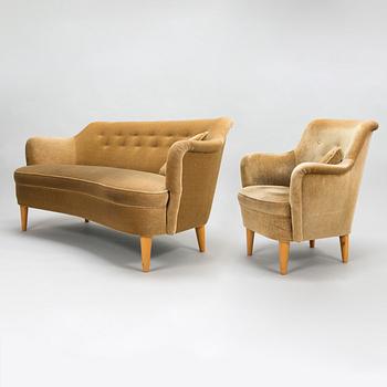 A mid-20th-century sofa and armchair.