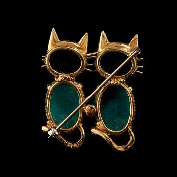 A amazonite, onyx and ruby brooch in the style of two cats.