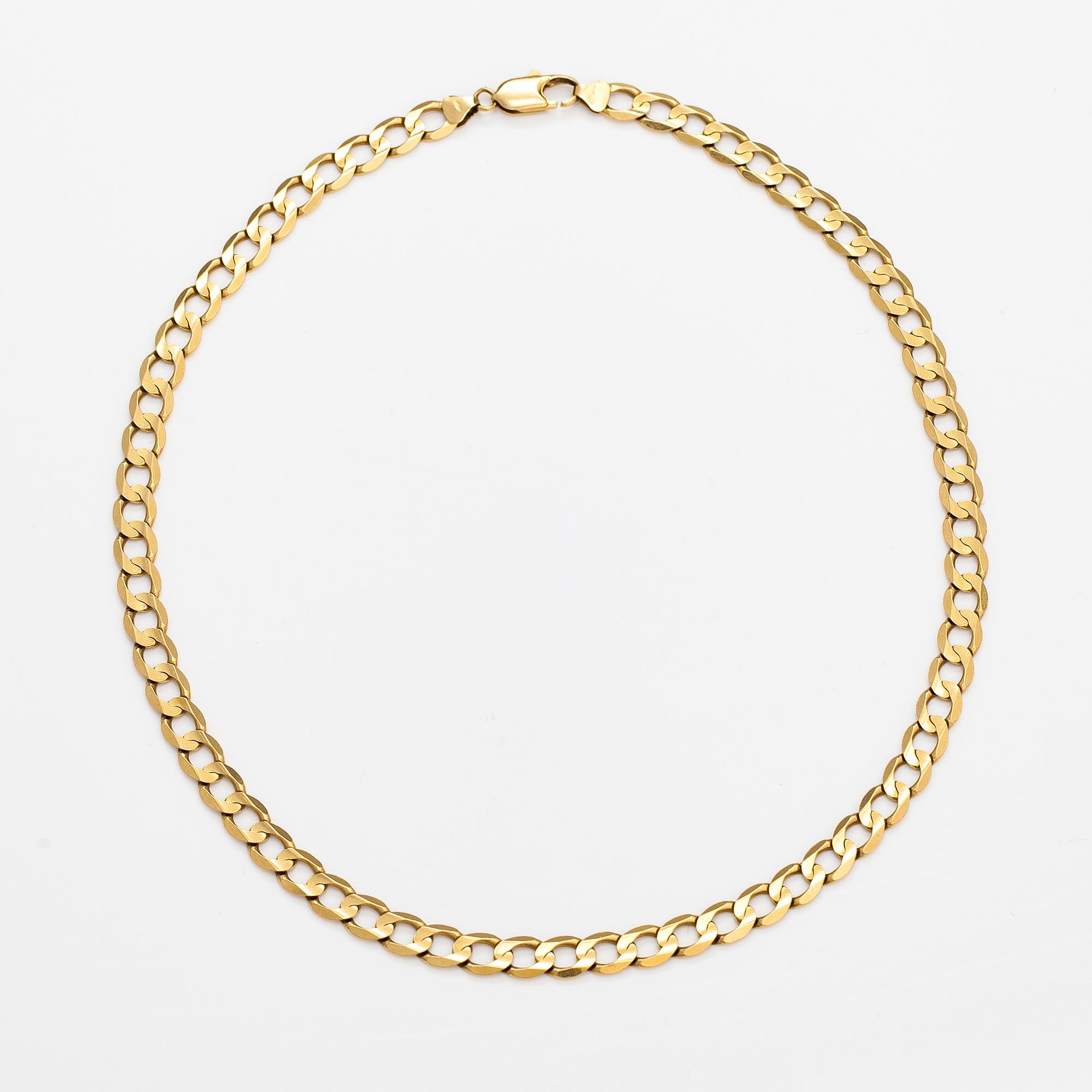 An 18K gold necklace. Unoaerre, Italy.