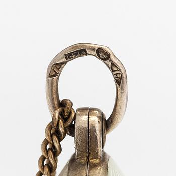 A gilded sterling silver necklace with a enameled locket. Tillander, Helsinki 1970's.
