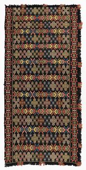 A flat weave carrige cushion, Scania , c 139 x 67 cm.