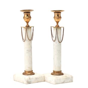 A pair of late Gustavian late 18th century candlesticks.