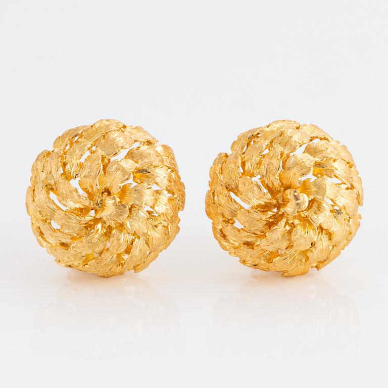 A pair of 18K gold earrings.