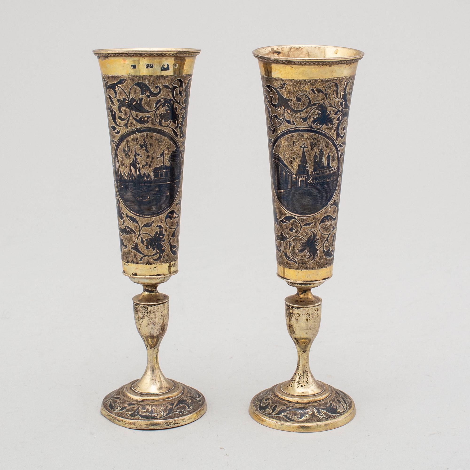 Two similar silver-gilt champagne flutes, unidentified makers mark, Moscow 1843.