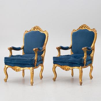 A pair of Louis XV style armchairs, 20th century.