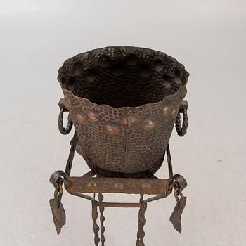 A metal pedestal and urn early 1900s.