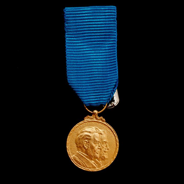 MEDALJ, 18 k guld, Sporrong, 1992. Vikt ca 5 g.