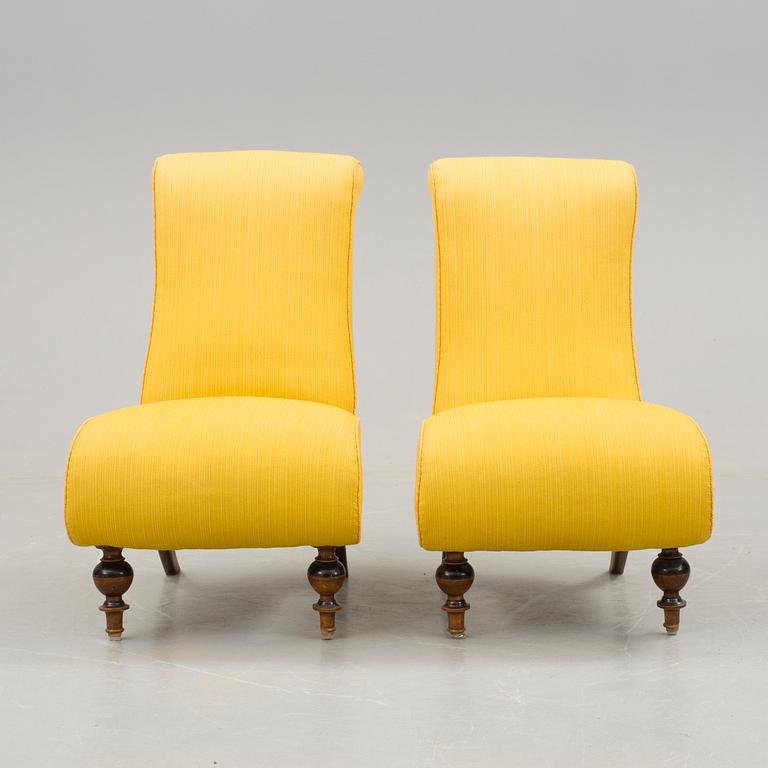 A pair of neo-renaissance easy chairs late 19th century.