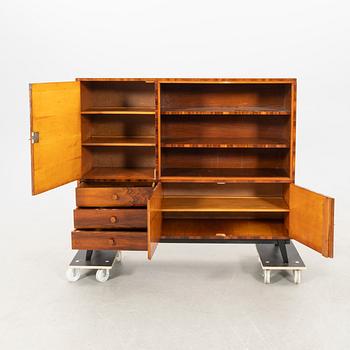 Display cabinet, 1940s.