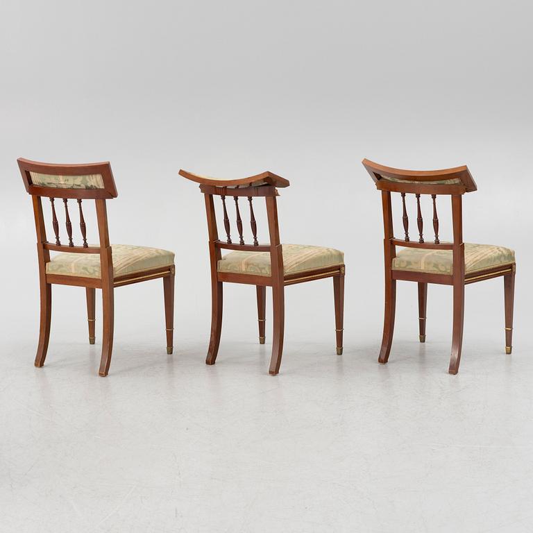 A sofa, two armchairs, four chairs and table, Empire style, 20th century.
