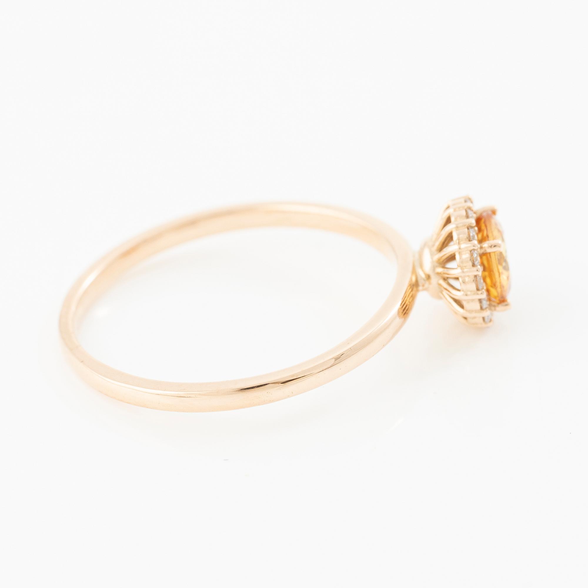 Ring 14K rose gold with orange sapphire and brilliant-cut diamonds.
