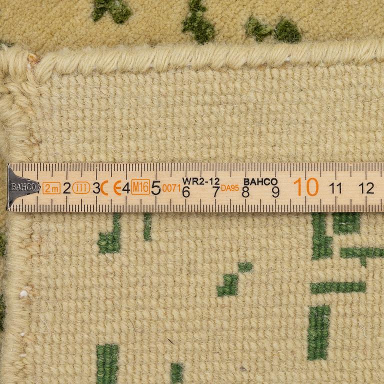 Rug, India, wool and silk with bamboo, approx. 230 x 173 cm.