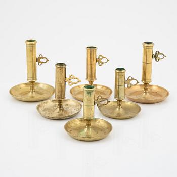 A set of six brass candlesticks, 19th/20th Century.