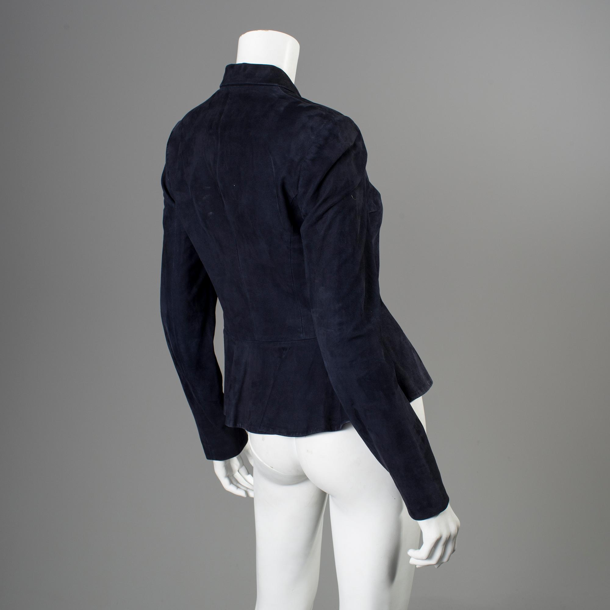 A darkblue suede jacket by Ralph Lauren.