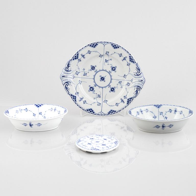 Four porcelain pieces of half lace "Musselmalet", Royal Copenhagen, Denmark, 1894-1945.