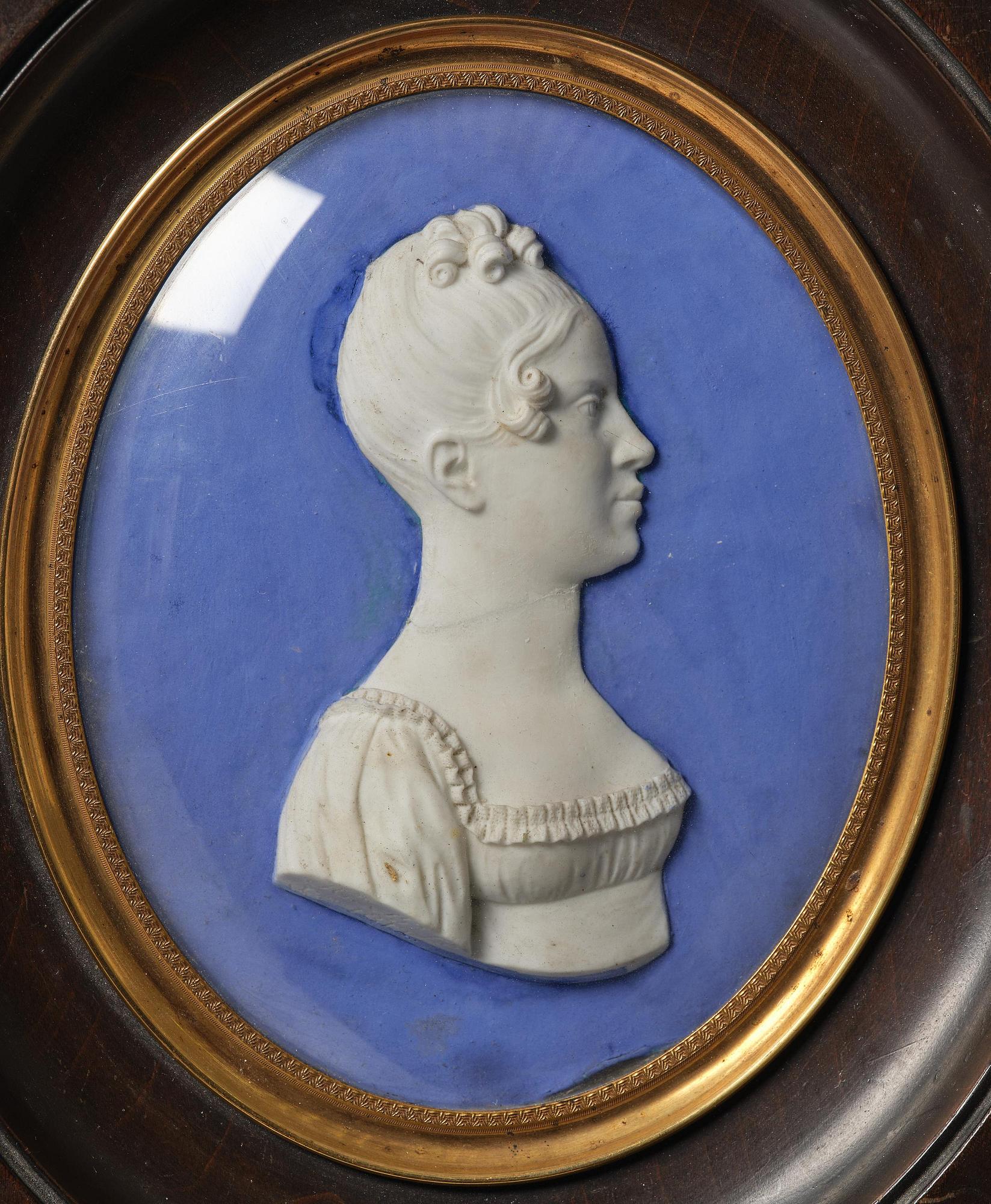 A pair of Sèvres biscuit plaques by Alexandre Brachard (1775-1843), dated 1812.