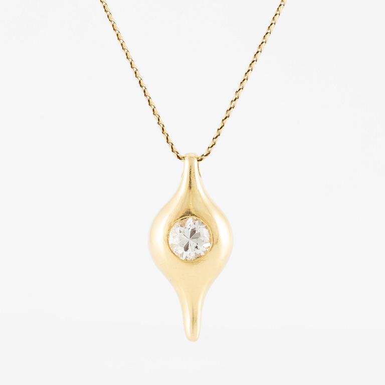 Pendant in 18K gold with a round brilliant-cut diamond.