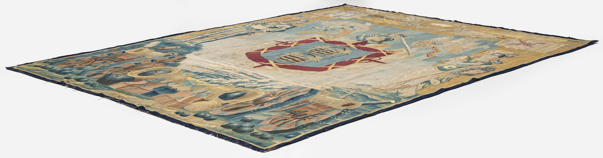 A Flemish armorial tapestry, c. 337 x 250 cm, 17th century.