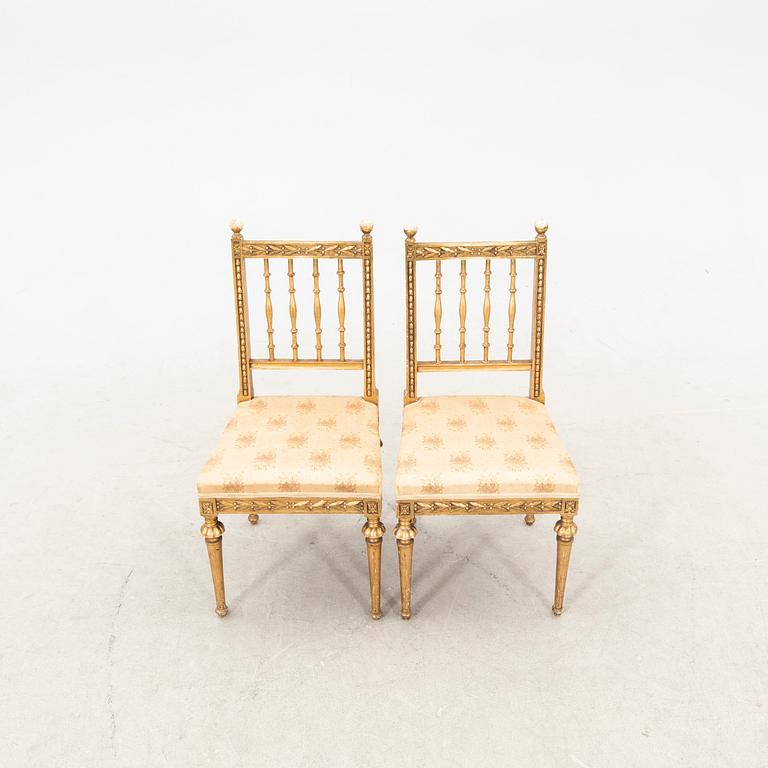 A set of four early 20th century Louis XVI-style chairs.