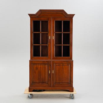 A vitrine cabinet from Åmells, dated 1974.