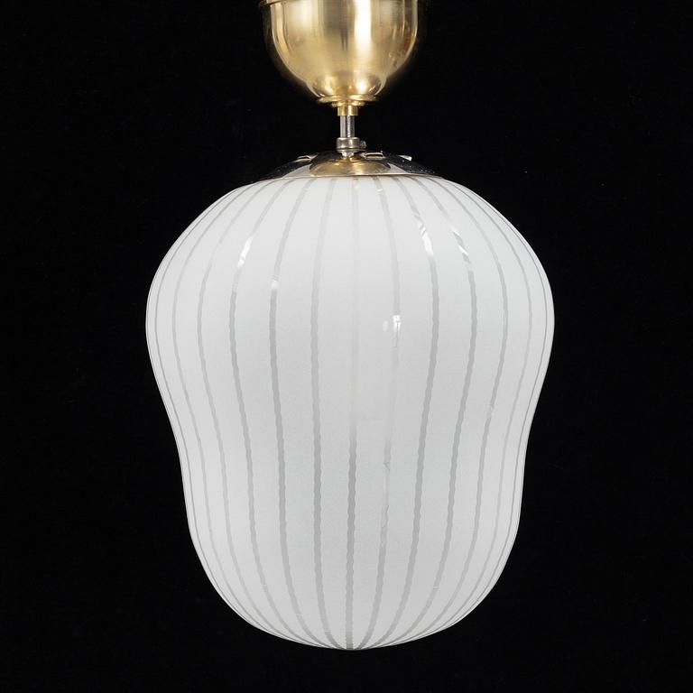 A Swedish Modern glass and brass ceiling light, Orrefors, 1940's.