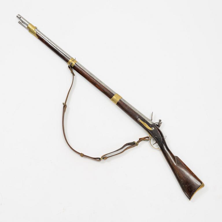 A Swedish flintlock rifle with Brtitish lock.