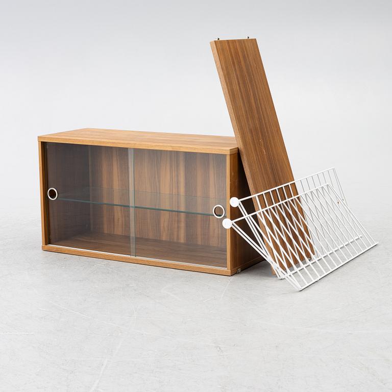 Nils Strinning, a "String" book case with cabinet, Sweden, 21st century.