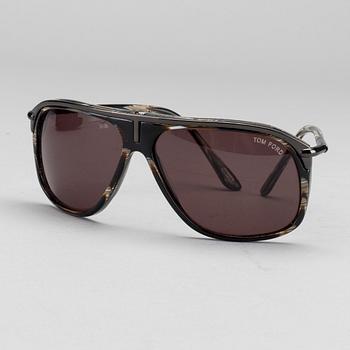 Two pair of Tom Ford Sunglasses.