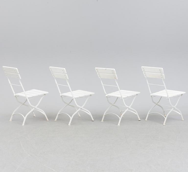 A Garden table with 4 chairs.