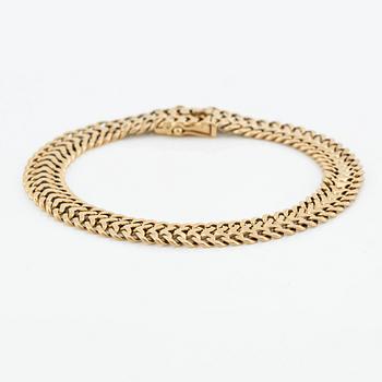 Armlänk, 18K guld, fiskbenslänk.
