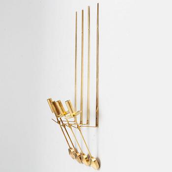 A set of four wall sconces by Pierre Forsell, Skultuna.