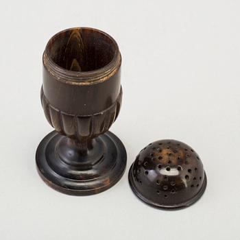 A 18th Century horn saltshaker.