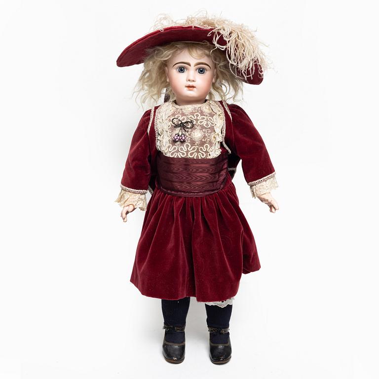 Girl doll, likely France, around the year 1900.