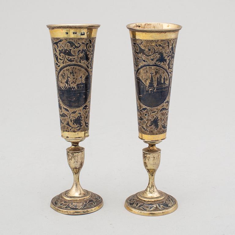 Two similar silver-gilt champagne flutes, unidentified makers mark, Moscow 1843.