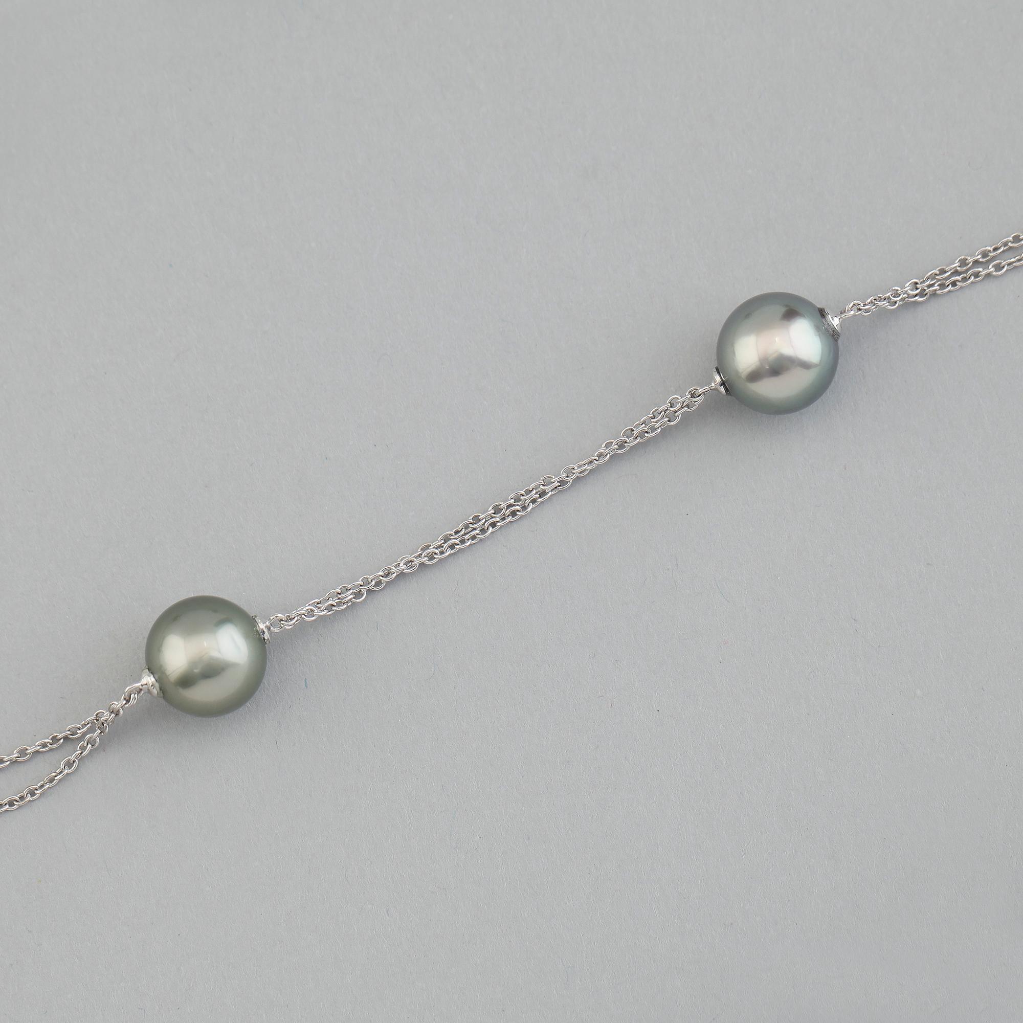 COLLIER, 14K vitguld, 8 tahitipärlor.