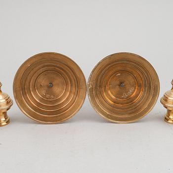 A pair of brass and marble candle holders/casslettes from Skultuna, 20th century.