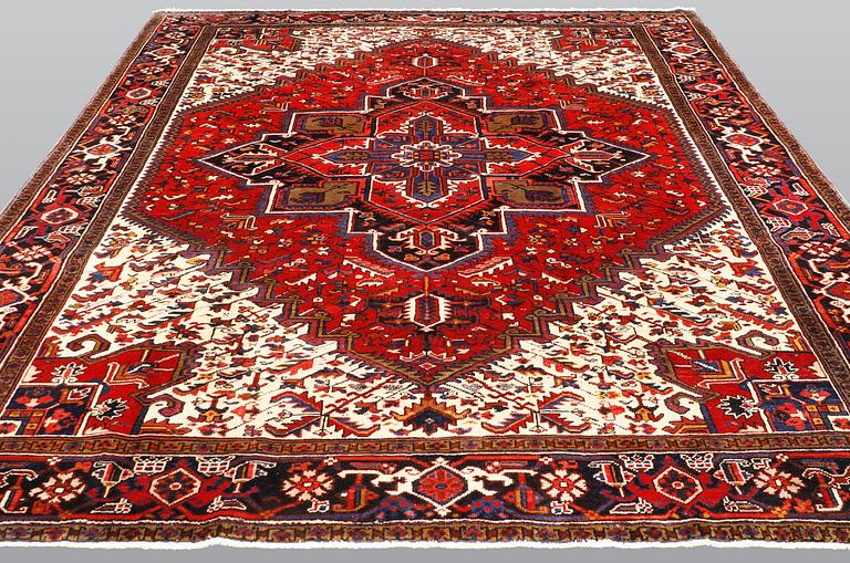 A carpet, Heriz, c. 307 x 246 cm.