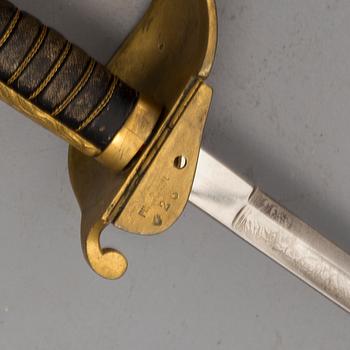 A naval officers sword 1915 pattern and a sword 1876 pattern.