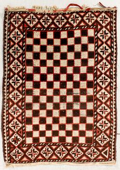 A semaintique/antique beludj carpet ca 115x86 cm.